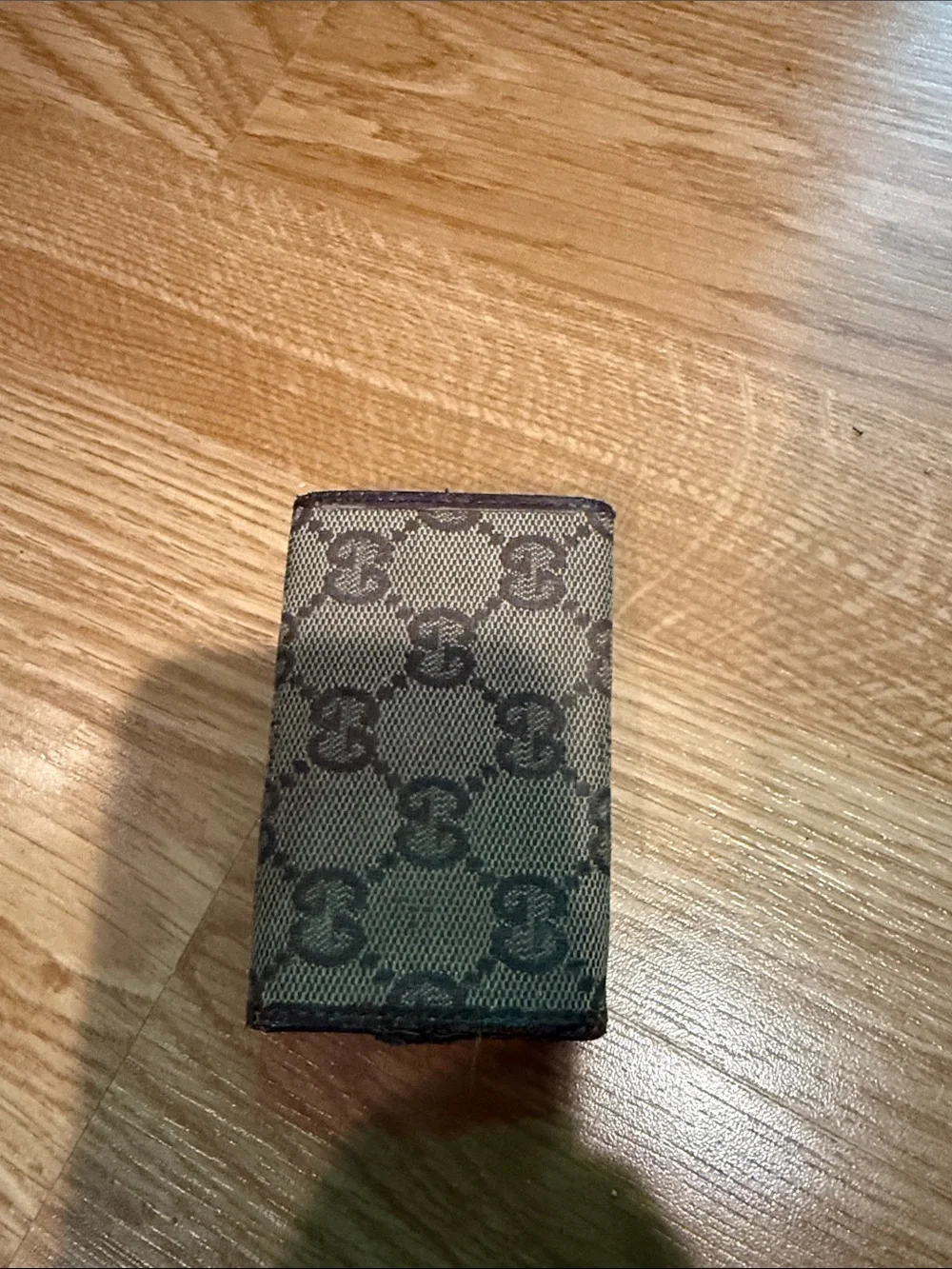 Gucci GG canvas key case featuring a brown leather trim & silver logo plaque - Picture 2 of 4